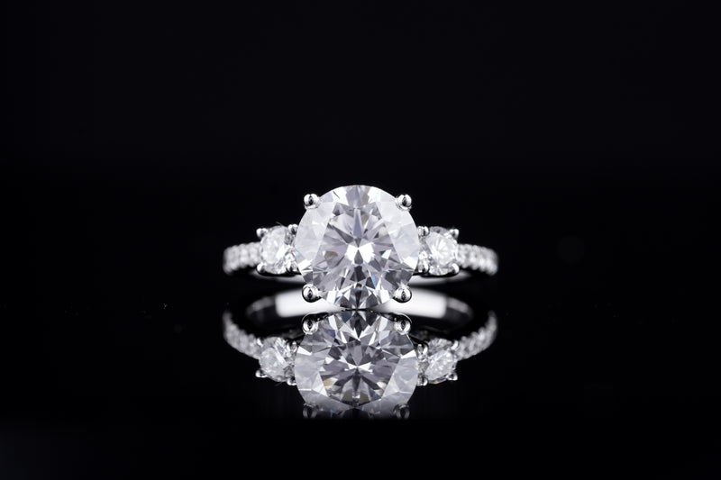 The Tunis Trio — Round cut engagement ring by Diamond Touch Toronto